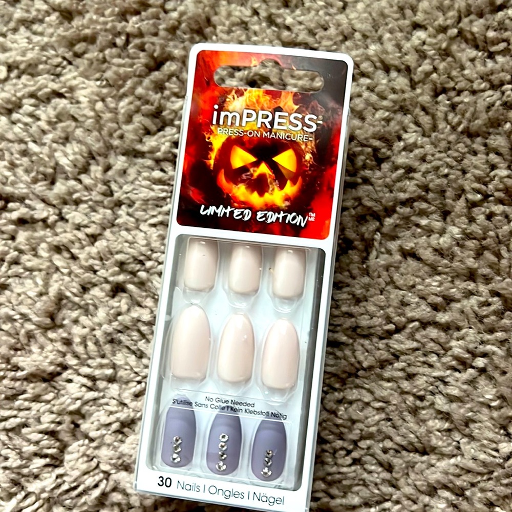 Impress press on manicure.